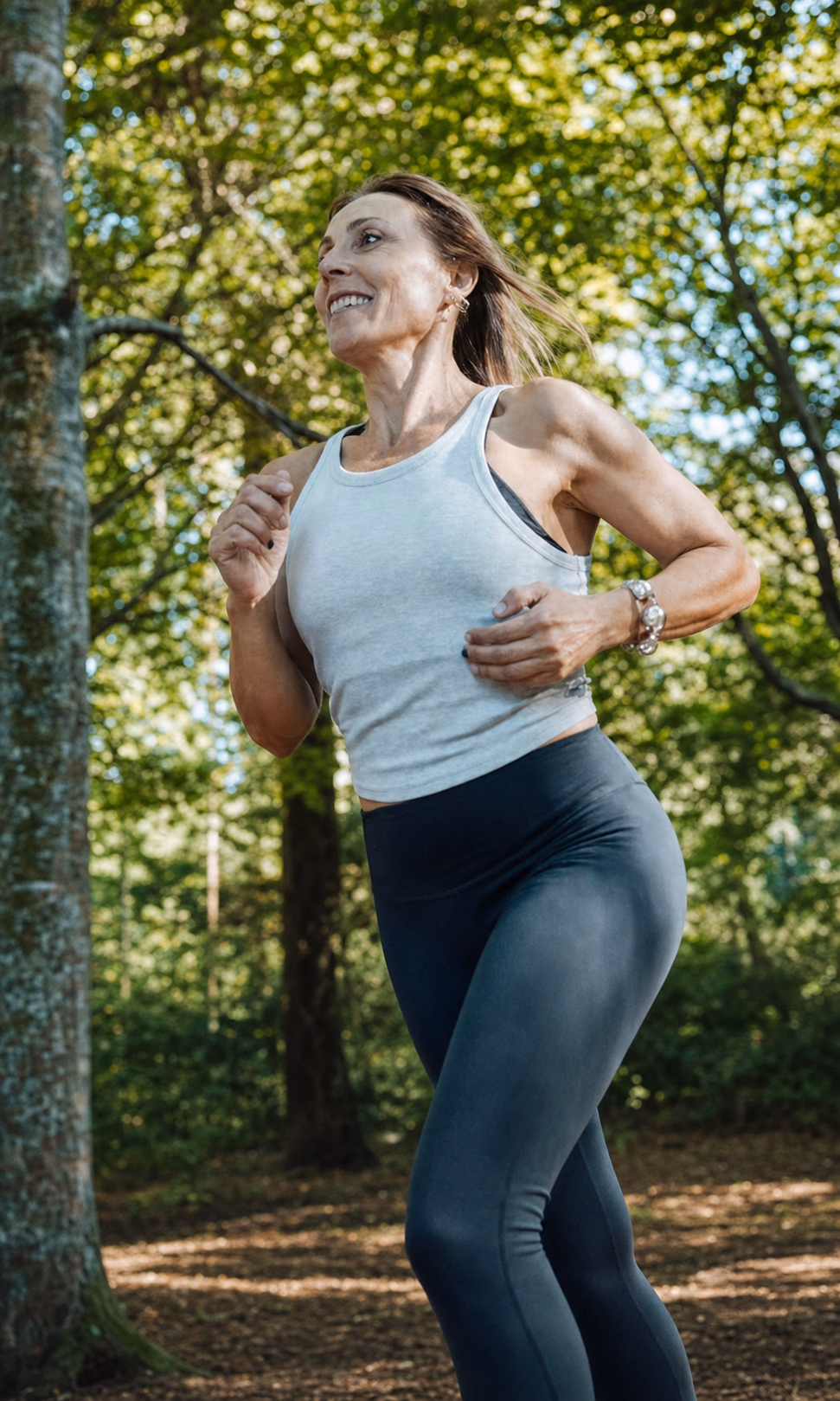 Strong mature woman running outdoors